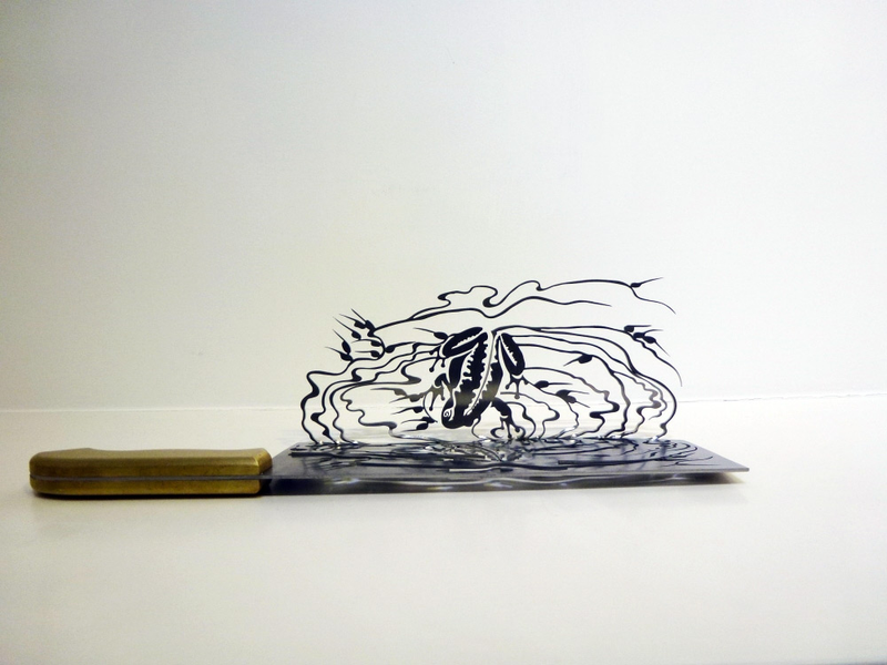 Illustration for article titled Intricate shadow silhouettes carved out of butcher's knife blades